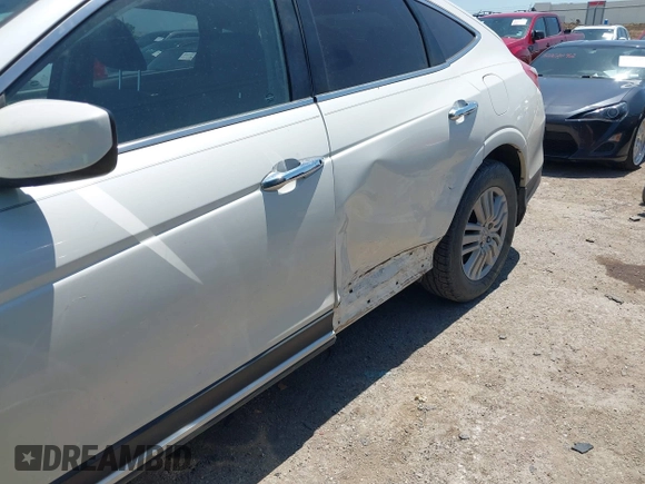 2013 Honda Crosstour EX-L z VIN 5J6TF3H55DL005237, wystawiony jako IAAI lot #42061486 z przebiegiem 154 611 mil mil oraz . Historia ofert i sprzedaży dostępna na DreamBid. Obrazek 6.