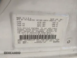 2011 Mitsubishi Galant FE with VIN 4A32B2FF0BE030385, listed as a IAAI auction lot 40740593 with 137,279 mi miles. Bid and sale history available at carsss.com. Image 9.