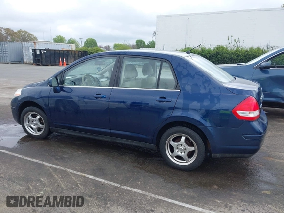 2007 Nissan Versa 1.8 SL with VIN 3N1BC11E67L420474, listed as a IAAI auction lot 41887735 with 199,094 mi miles. Bid and sale history available at carsss.com. Image 14.