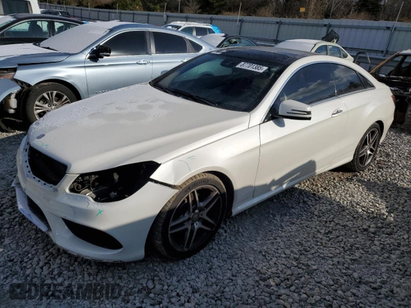 2016 Mercedes-Benz E-Class E 400 with VIN WDDKJ6FB0GF348458, listed as a Copart auction lot 87701385 with 124,867 mi miles and Salvage Title. Bid and sale history available at carsss.com. Image 1.