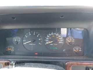 1997 Jeep Grand Cherokee Laredo with VIN 1J4GZ58S7VC713517, listed as a IAAI auction lot 42062214 with 205,533 mi miles. Bid and sale history available at carsss.com. Image 7.