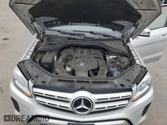 2017 Mercedes-Benz GLS 450 с VIN 4JGDF6EE9HA809960, выставлен на аукционе Copart как лот 49313075 с пробегом 81 999 миль миль и Списание • Salvage title. История ставок и продаж доступна на DreamBid. Изображение 12.