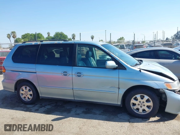 2003 Honda Odyssey EX-L with VIN 5FNRL18973B148675, listed as a IAAI auction lot 41992952 with 232,013 mi miles and . Bid and sale history available at DreamBid. Image 13.