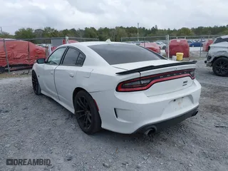 2020 Dodge Charger Scat Pack with VIN 2C3CDXGJ9LH114575, listed as a IAAI auction lot 41682792 with 137,321 mi miles. Bid and sale history available at carsss.com. Image 3.