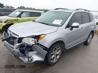 2015 Subaru Forester Touring with VIN JF2SJAUC8FH467730, listed as a IAAI auction lot 42403195 with 142,287 mi miles and . Bid and sale history available at DreamBid. Image 18.