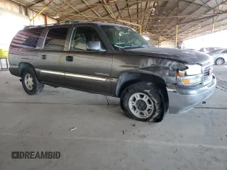 2002 GMC Yukon XL SLT z VIN 3GKFK16Z52G322815, wystawiony jako Copart lot #50641765 z przebiegiem Nie podano mil oraz Szkody całkowita. Historia ofert i sprzedaży dostępna na DreamBid. Obrazek 4.