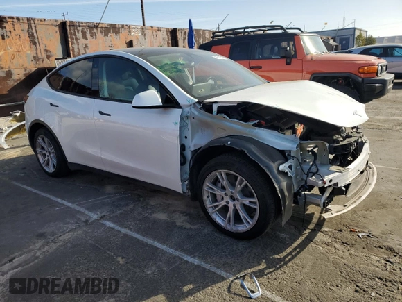 2023 Tesla Model Y Long Range with VIN 7SAYGAEE7PF619170, listed as a Copart auction lot 47647585 with 35,674 mi miles and Salvage Title. Bid and sale history available at DreamBid. Image 4.