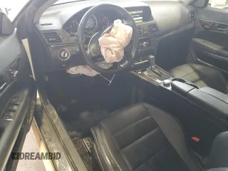 2011 Mercedes-Benz E 350 with VIN WDDKK5GFXBF080696, listed as a Copart auction lot 47442285 with 75,497 mi miles and Salvage title. Bid and sale history available at DreamBid. Image 8.