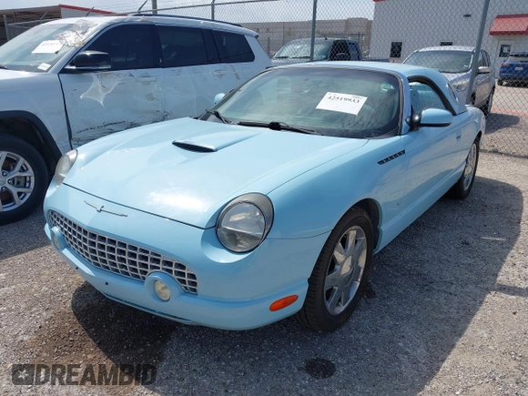 2003 Ford Thunderbird Deluxe z VIN 1FAHP60A53Y101461, wystawiony jako IAAI lot #42519933 z przebiegiem 64 820 mil mil oraz . Historia ofert i sprzedaży dostępna na DreamBid. Obrazek 17.