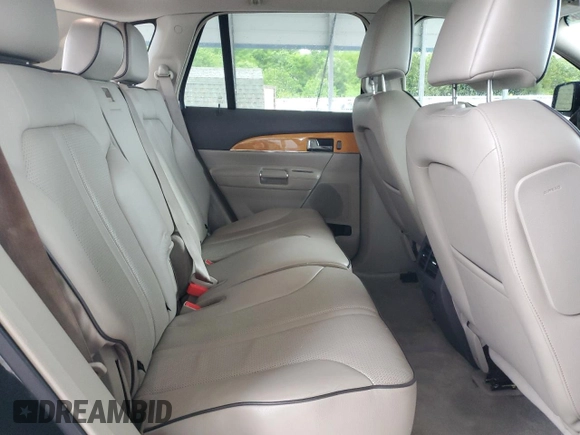 2011 Lincoln MKX z VIN 2LMDJ6JK7BBJ17139, wystawiony jako Copart lot #55166405 z przebiegiem 193 944 mil mil oraz Czysty tytuł • Clean title. Historia ofert i sprzedaży dostępna na DreamBid. Obrazek 11.