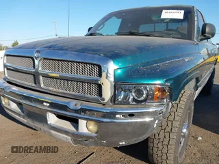 1999 Dodge Ram 2500 with VIN 3B7KC23Z5XG118959, listed as a IAAI auction lot 40484594 with 176,946 mi miles. Bid and sale history available at carsss.com. Image 6.