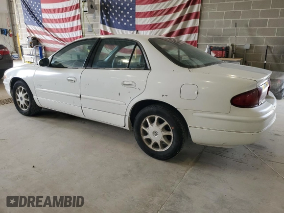 1998 Buick Regal LS with VIN 2G4WB52K5W1415761, listed as a Copart auction lot 55811595 with 102,133 mi miles and Salvage title. Bid and sale history available at DreamBid. Image 2.