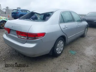 2003 Honda Accord LX z VIN 1HGCM56363A140358, wystawiony jako IAAI lot #42365056 z przebiegiem 202 238 mil mil oraz . Historia ofert i sprzedaży dostępna na DreamBid. Obrazek 4.