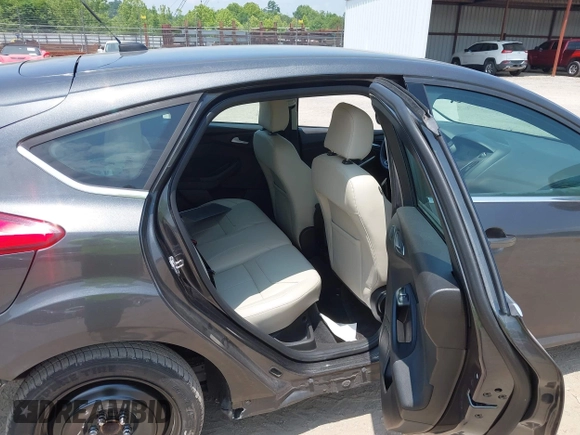 2016 Ford Focus Titanium with VIN 1FADP3N28GL299339, listed as a IAAI auction lot 42410154 with 78,245 mi miles and . Bid and sale history available at DreamBid. Image 8.