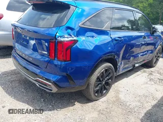 2021 Kia Sorento SX z VIN 5XYRK4LF5MG028384, wystawiony jako IAAI lot #42132667 z przebiegiem 64 649 mil mil oraz . Historia ofert i sprzedaży dostępna na DreamBid. Obrazek 4.