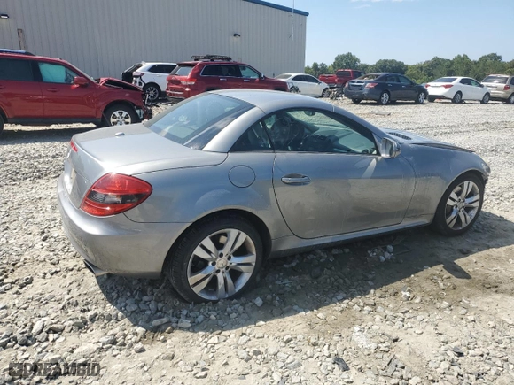 2009 Mercedes-Benz SLK-Class 3.5L with VIN WDBWK58F79F191533, listed as a Copart auction lot 68678724 with 70,418 mi miles and Salvage Title. Bid and sale history available at carsss.com. Image 3.