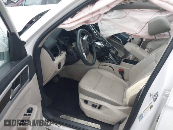 2022 Volkswagen Atlas SE with VIN 1V2KR2CA0NC509427, listed as a IAAI auction lot 42440164 with 52,898 mi miles and . Bid and sale history available at DreamBid. Image 5.