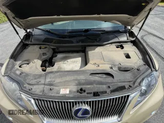 2012 Lexus RX 450h z VIN JTJBC1BA5C2427885, wystawiony jako Copart lot #58626695 z przebiegiem 166 056 mil mil oraz Szkoda całkowita • Salvage title. Historia ofert i sprzedaży dostępna na DreamBid. Obrazek 7.