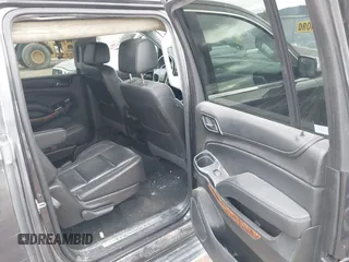 2018 Chevrolet Suburban Premier z VIN 1GNSKJKC3JR189621, wystawiony jako IAAI lot #41925416 z przebiegiem 150 775 mil mil oraz . Historia ofert i sprzedaży dostępna na DreamBid. Obrazek 8.
