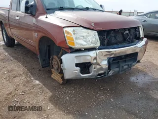 2004 Nissan Titan XE with VIN 1N6AA06A04N508069, listed as a IAAI auction lot 41571931 with 180,119 mi miles. Bid and sale history available at carsss.com. Image 6.