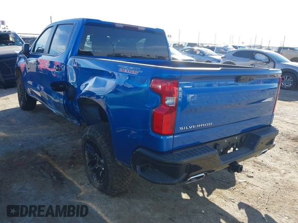 2023 Chevrolet Silverado 1500 LT Trail Boss with VIN 3GCUDFED9PG117005, listed as a IAAI auction lot 41505108 with 14,575 mi miles and . Bid and sale history available at DreamBid. Image 3.