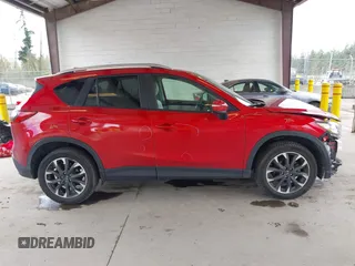 2016 Mazda CX-5 Grand Touring with VIN JM3KE4DY3G0688062, listed as a IAAI auction lot 42025169 with 59,867 mi miles and . Bid and sale history available at carsss.com. Image 14.