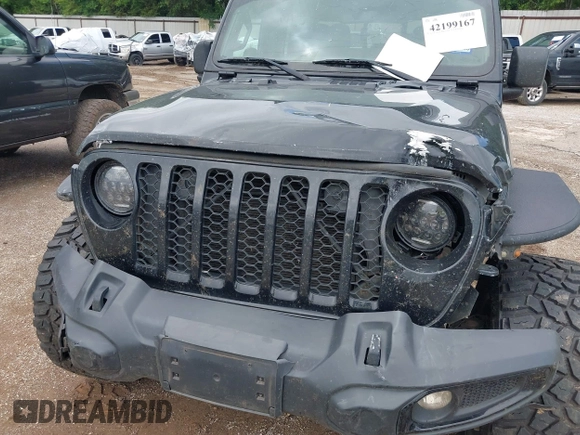 2021 Jeep Gladiator Sport S with VIN 1C6JJTAM7ML554412, listed as a IAAI auction lot 42199167 with 74,263 mi miles and . Bid and sale history available at DreamBid. Image 6.