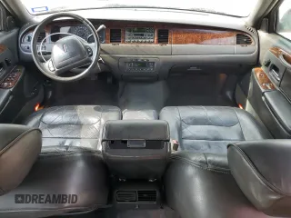 2001 Lincoln Town Car Executive z VIN 1LNHM81W11Y647756, wystawiony jako Copart lot #54741135 z przebiegiem 191 580 mil mil oraz Szkoda całkowita • Salvage title. Historia ofert i sprzedaży dostępna na DreamBid. Obrazek 8.