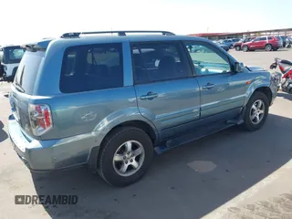 2006 Honda Pilot EX-L with VIN 2HKYF18536H548948, listed as a IAAI auction lot 36572651 with 242,758 mi miles and . Bid and sale history available at DreamBid. Image 4.