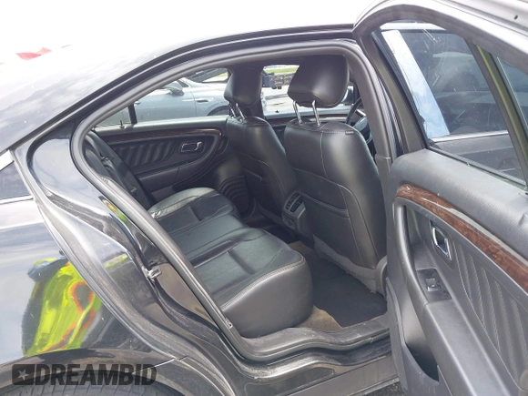 2013 Ford Taurus Limited with VIN 1FAHP2F84DG220283, listed as a IAAI auction lot 40045974 with 155,409 mi miles and . Bid and sale history available at DreamBid. Image 8.