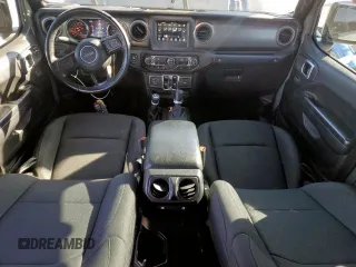 2021 Jeep Wrangler Unlimited Sport S with VIN 1C4HJXDG4MW699376, listed as a Copart auction lot 47202615 with 57,192 mi miles and Salvage Title. Bid and sale history available at DreamBid. Image 8.