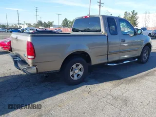 2002 Ford F-150 XL with VIN 1FTRX17232NA79508, listed as a IAAI auction lot 41870844 with 111,429 mi miles. Bid and sale history available at carsss.com. Image 4.
