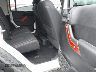 2014 Jeep Wrangler Unlimited Sahara with VIN 1C4BJWEG1EL127232, listed as a IAAI auction lot 41847368 with 109,975 mi miles. Bid and sale history available at carsss.com. Image 8.