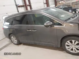 2015 Honda Odyssey EX-L with VIN 5FNRL5H64FB055890, listed as a IAAI auction lot 41706141 with 155,167 mi miles and . Bid and sale history available at carsss.com. Image 13.
