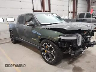 2022 Rivian R1T Adventure Package with VIN 7FCTGAAA0NN004365, listed as a IAAI auction lot 41534730 with 1 mi miles. Bid and sale history available at carsss.com. Image 1.