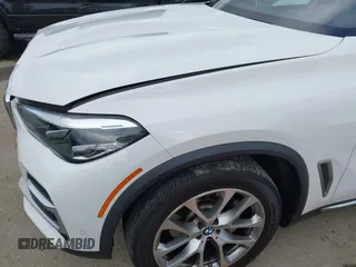 2021 BMW X5 xDrive40i with VIN 5UXCR6C03M9G36156, listed as a IAAI auction lot 42125009 with 30,877 mi miles. Bid and sale history available at carsss.com. Image 17.