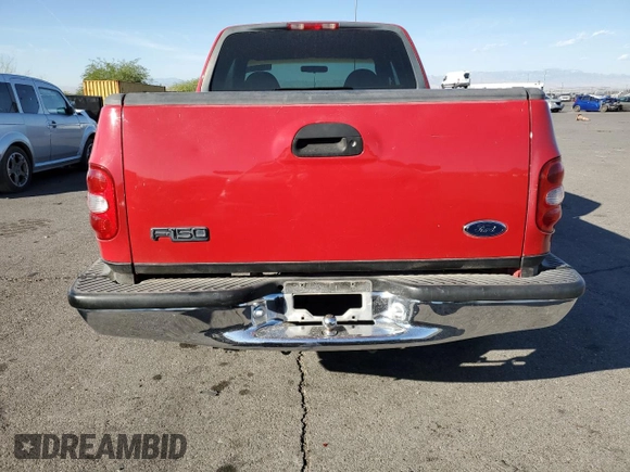 1999 Ford F-150 with VIN 1FTRX07W2XKC24186, listed as a Copart auction lot 74553294 with Not provided miles and Salvage title. Bid and sale history available at DreamBid. Image 6.