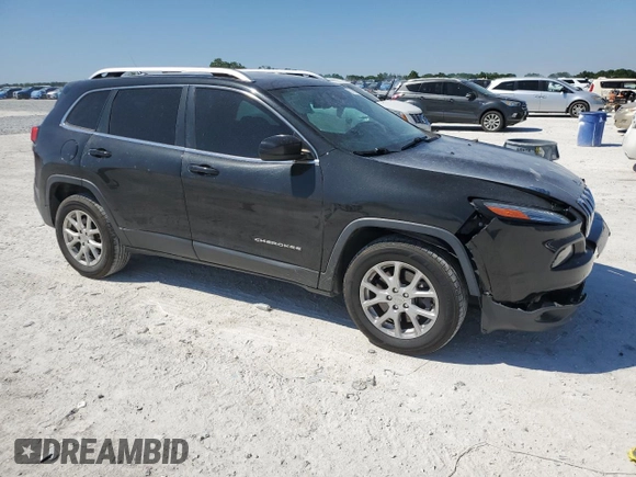 2015 Jeep Cherokee Latitude with VIN 1C4PJMCS6FW558716, listed as a Copart auction lot 50702375 with 133,088 mi miles and Salvage Title. Bid and sale history available at DreamBid. Image 4.
