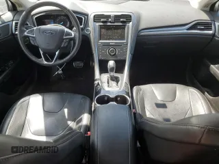 2014 Ford Fusion Titanium с VIN 3FA6P0K97ER293233, выставлен на аукционе Copart как лот 54256985 с пробегом 111 854 миль миль и Списание • Salvage title. История ставок и продаж доступна на DreamBid. Изображение 8.