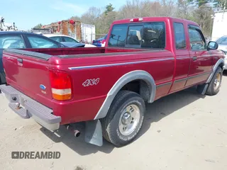 1997 Ford Ranger XLT with VIN 1FTCR15XXVTA14735, listed as a IAAI auction lot 42113672 with 114,939 mi miles. Bid and sale history available at carsss.com. Image 4.