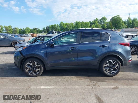 2021 Kia Sportage EX z VIN KNDPNCAC4M7897590, wystawiony jako IAAI lot #42183678 z przebiegiem 110 657 mil mil oraz . Historia ofert i sprzedaży dostępna na DreamBid. Obrazek 14.