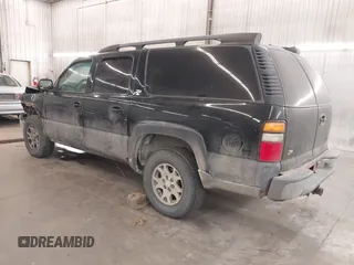 2004 Chevrolet Suburban Z71 with VIN 3GNFK16Z94G288951, listed as a IAAI auction lot 41697814 with 176,257 mi miles. Bid and sale history available at carsss.com. Image 3.