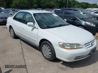 2002 Honda Accord LX z VIN 1HGCG56482A067556, wystawiony jako IAAI lot #42494292 z przebiegiem 209 511 mil mil oraz . Historia ofert i sprzedaży dostępna na DreamBid. Obrazek 1.
