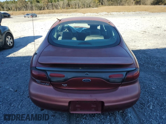 1998 Ford Taurus z VIN 1FAFP52S5WA261151, wystawiony jako Copart lot #83960754 z przebiegiem 135 049 mil mil oraz Szkoda całkowita • Salvage title. Historia ofert i sprzedaży dostępna na DreamBid. Obrazek 6.