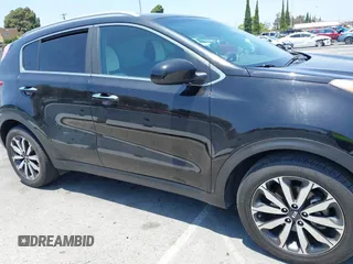 2017 Kia Sportage EX z VIN KNDPN3AC1H7242955, wystawiony jako IAAI lot #42473072 z przebiegiem 112 038 mil mil oraz . Historia ofert i sprzedaży dostępna na DreamBid. Obrazek 13.