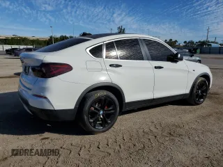 2015 BMW X4 xDrive28i with VIN 5UXXW3C57F0M88974, listed as a Copart auction lot 36212923 with 138,948 mi miles. Bid and sale history available at carsss.com. Image 3.