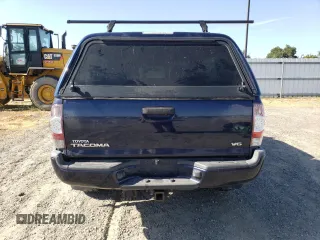 2014 Toyota Tacoma with VIN 5TFUU4EN4EX093945, listed as a Copart auction lot 58975405 with 111,695 mi miles and Salvage title. Bid and sale history available at DreamBid. Image 6.