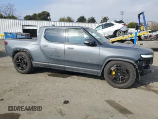 2022 Rivian R1T Adventure Package with VIN 7FCTGAAA7NN006498, listed as a Copart auction lot 89338075 with 46,384 mi miles and Salvage Title. Bid and sale history available at carsss.com. Image 4.
