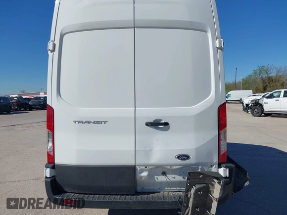 2023 Ford Transit Cargo with VIN 1FTBR2X82PKA33456, listed as a IAAI auction lot 41856428 with 54,088 mi miles and . Bid and sale history available at DreamBid. Image 16.
