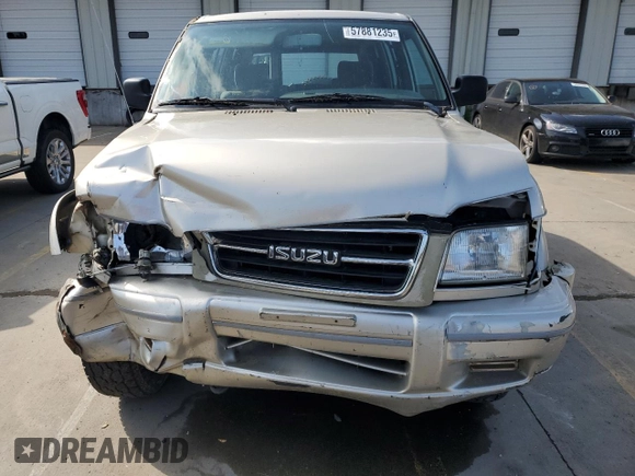 1999 Isuzu Trooper S with VIN JACDJ58X6X7924973, listed as a Copart auction lot 57881235 with 269,301 mi miles and Salvage title. Bid and sale history available at DreamBid. Image 5.